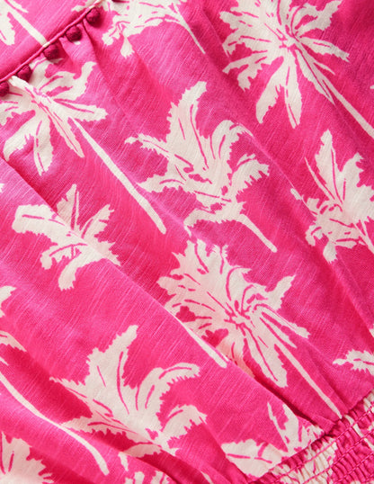 Ciara Pom Trim Jersey Romper-Pink Palm Trees