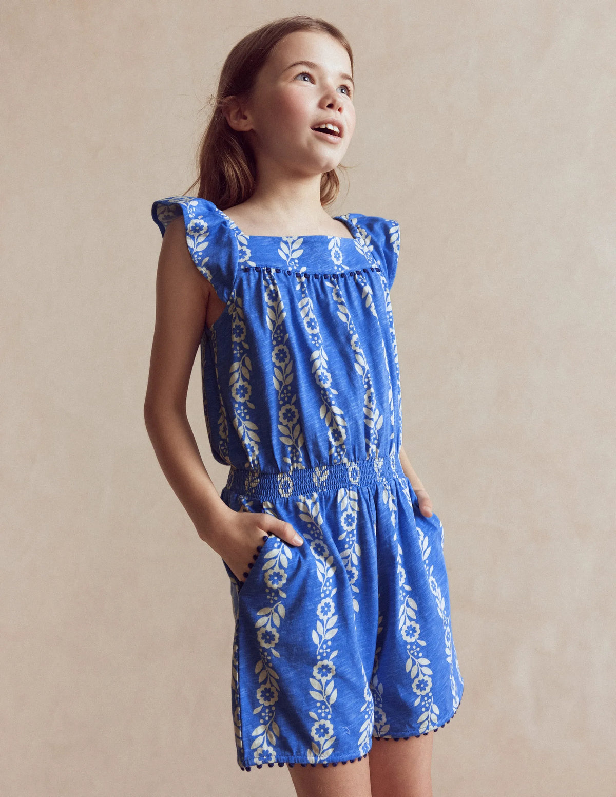 Ciara Pom Trim Jersey Romper-Blue Floral